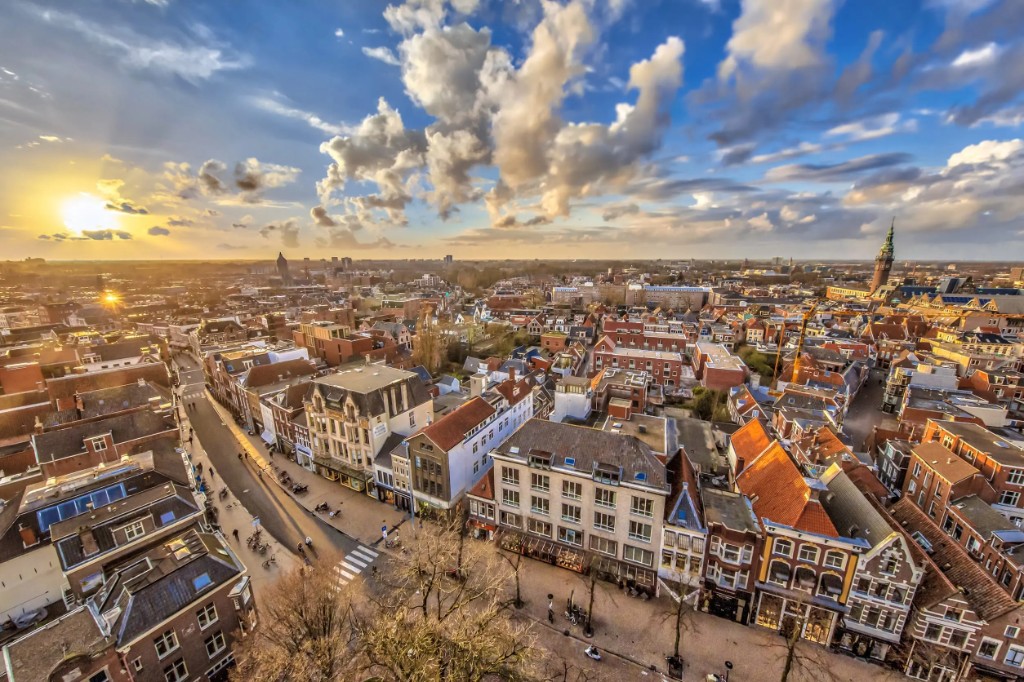Aerial view over the rooftops of central Groningen at sunset
